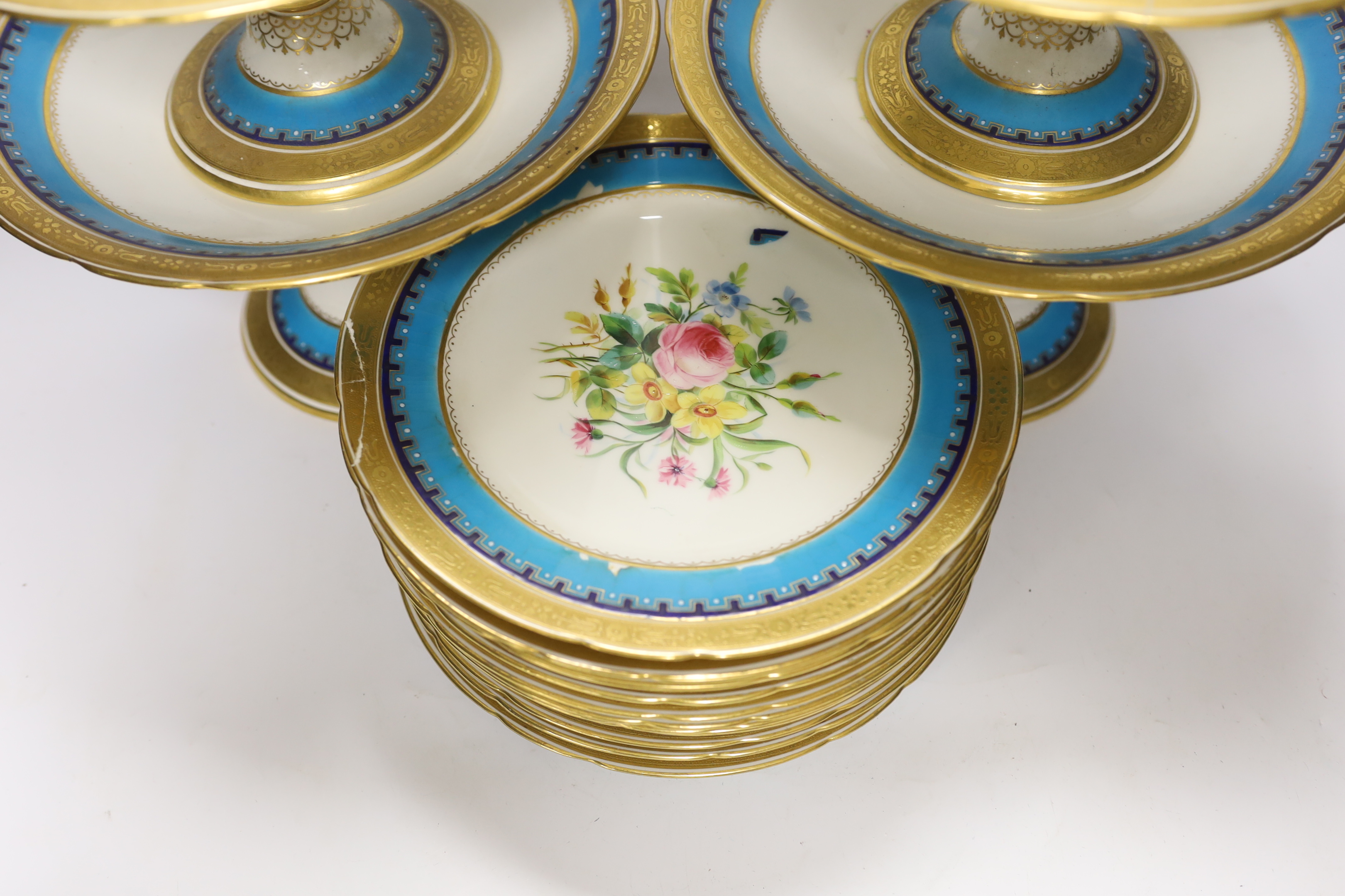 A 19th century Minton porcelain dessert service with gilt and floral decoration, twelve plates and two pairs of various height comports, tallest 16.5cm high